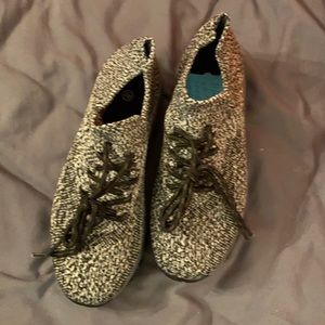 Black and white slip on sneakers. Size 36 European. Fits like  US size 5.